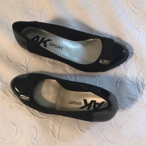 Ladies black wedge shoes.